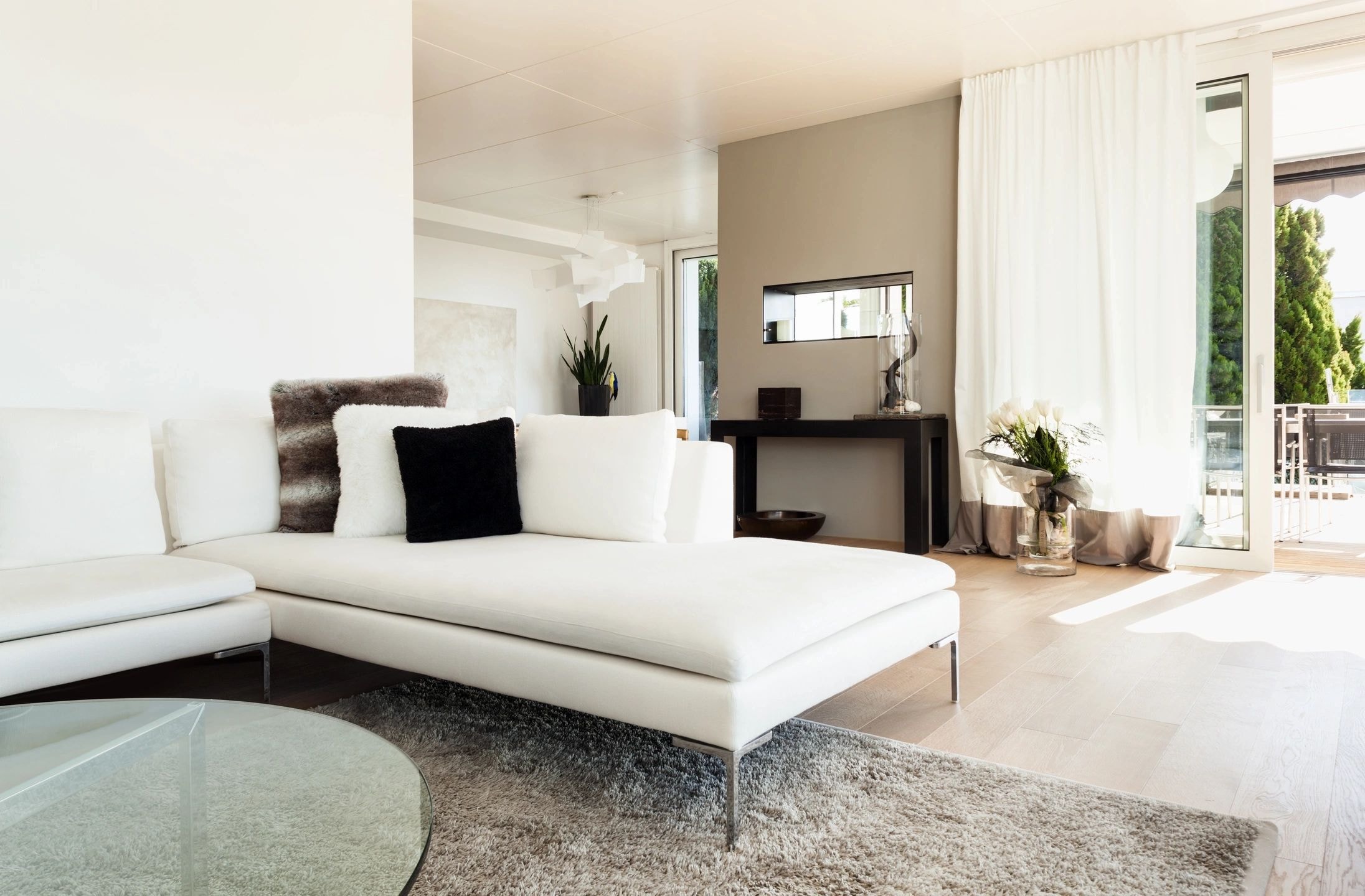 Modern living room with light wood flooring