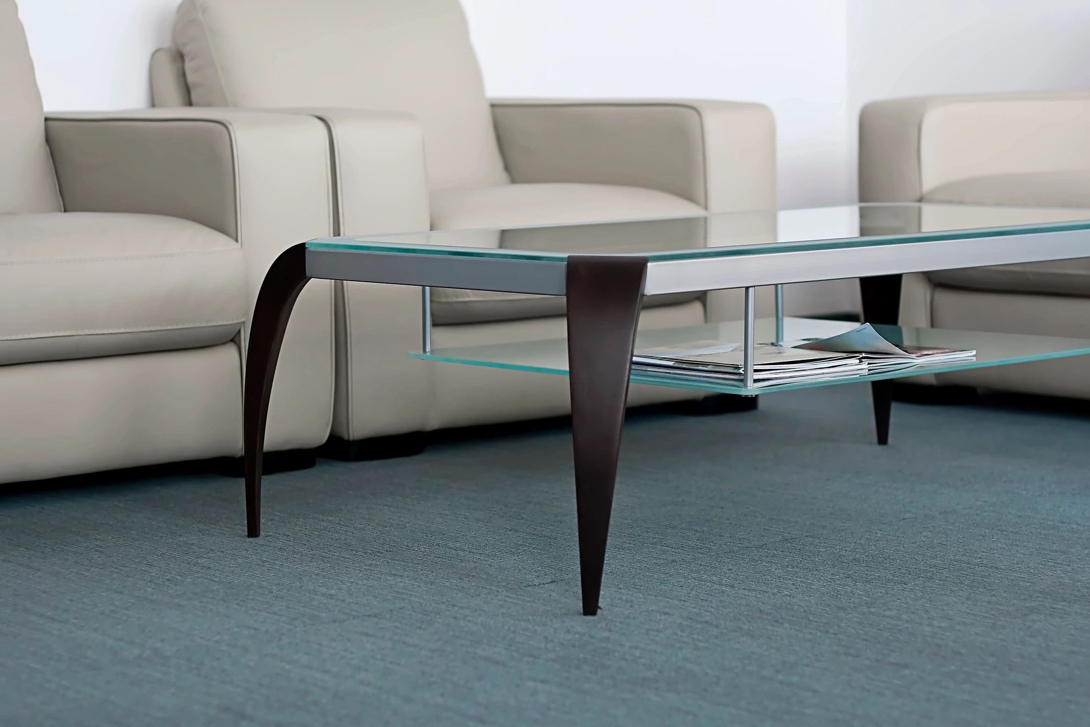 Lounge area with teal carpet